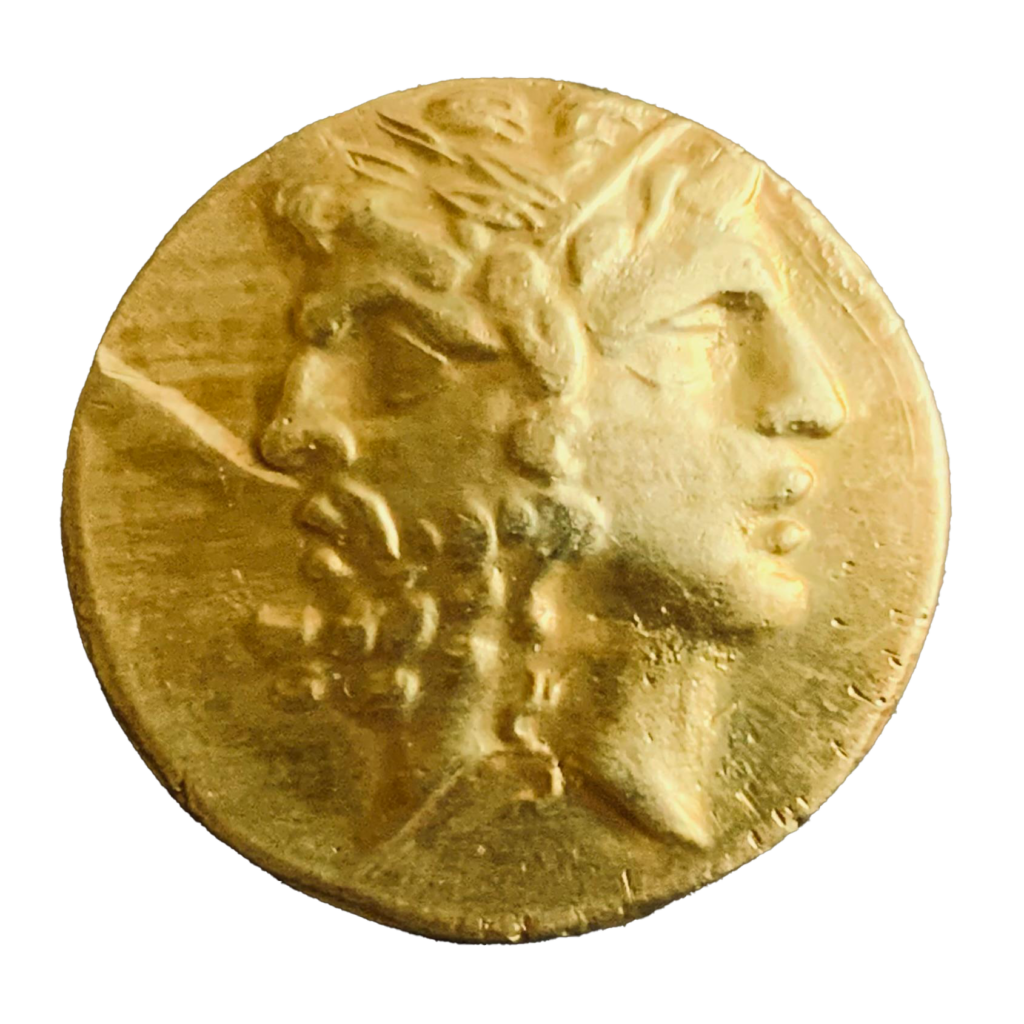 An ancient gold coin on a dark background