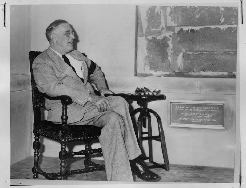 Franklin D Roosevelt sitting in a chair