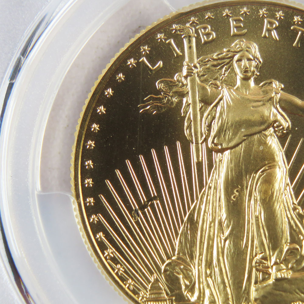 Gold Eagle coin with a minting error in the design
